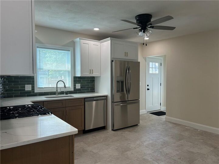 Property Photo:  76 Rosella Avenue  RI 02861 