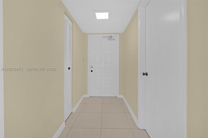Property Photo:  15545 N Miami Lakeway N 106  FL 33014 