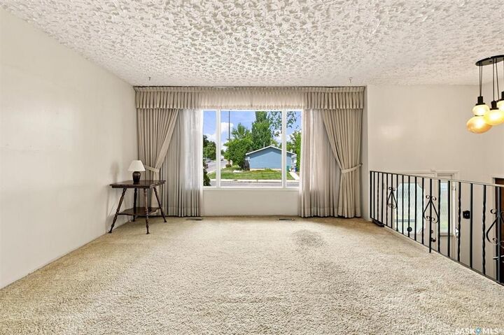 Property Photo:  125 Arnason Crescent  SK S7H 4M7 