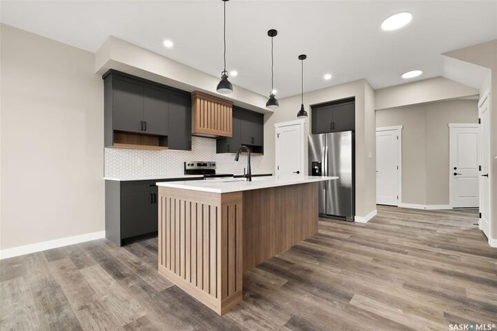 Property Photo: 2958 Dumont Way SK S4V 4E4