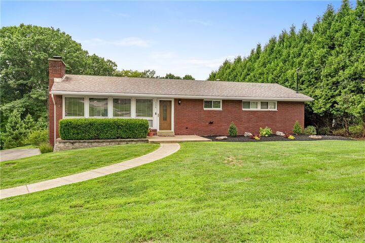 Property Photo:  336 Maple Rd  PA 15239 