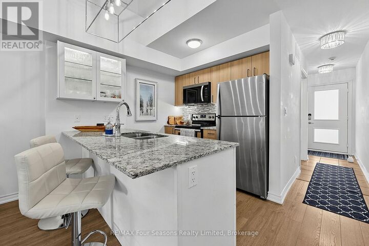 Property Photo:  4 Cove Court 302  ON L9Y 0Y6 