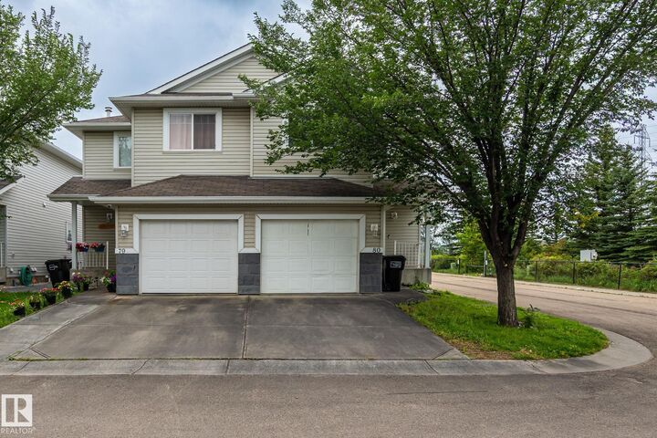 Property Photo:  #80 4350 23st NW  AB T6T 1X8 