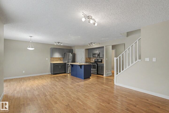 Property Photo:  8602 Southfort Boulevard 11  AB T8L 0J8 