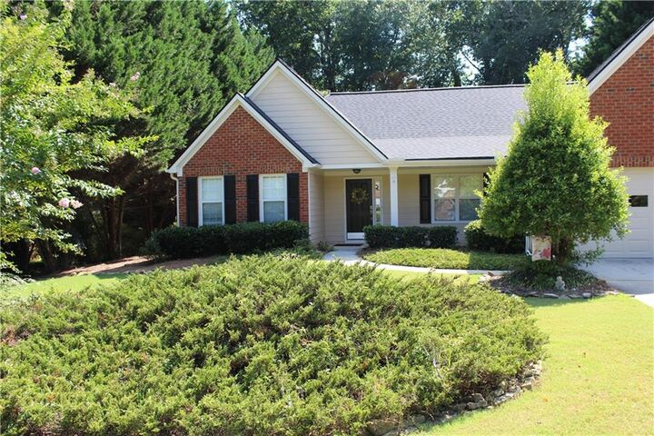 Property Photo:  7730 Timberline Ovlk  GA 30041 