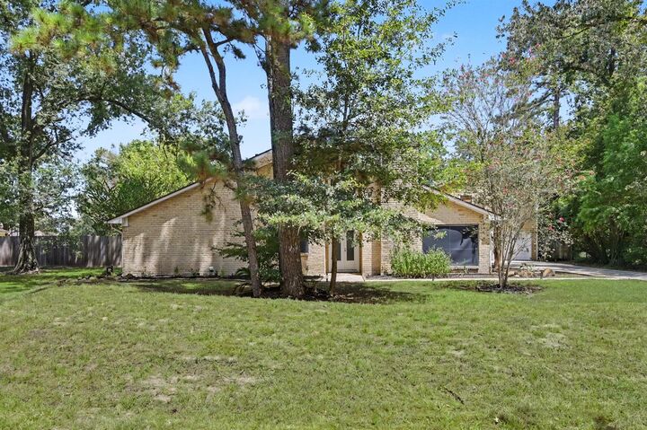 Property Photo:  2407 Fawnwood Lane  TX 77386 