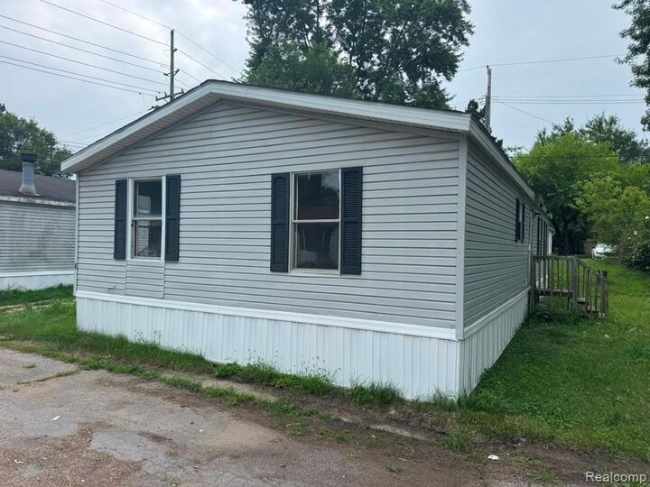 Property Photo: 2445 E Grand River Rd Lot #2 MI 48895 9577