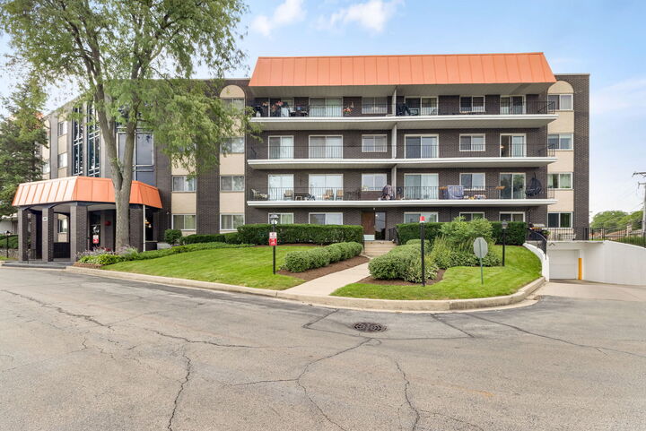 Property Photo:  4949 Golf Road 310  IL 60077 