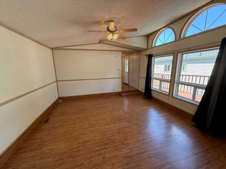 Property Photo: 700 Carmichael Lane 402 AB T7V 1S9