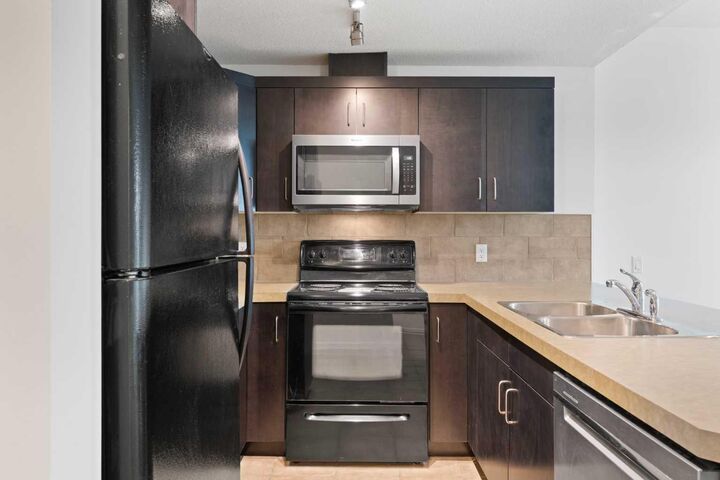 Property Photo: 1410 1 Street SE 309 AB T2G 5T7