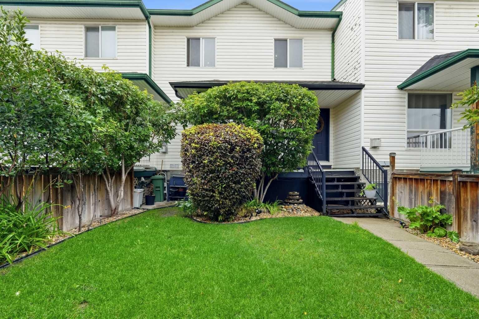 Property Photo: 42H Green Meadow Crescent AB T1P 1H7