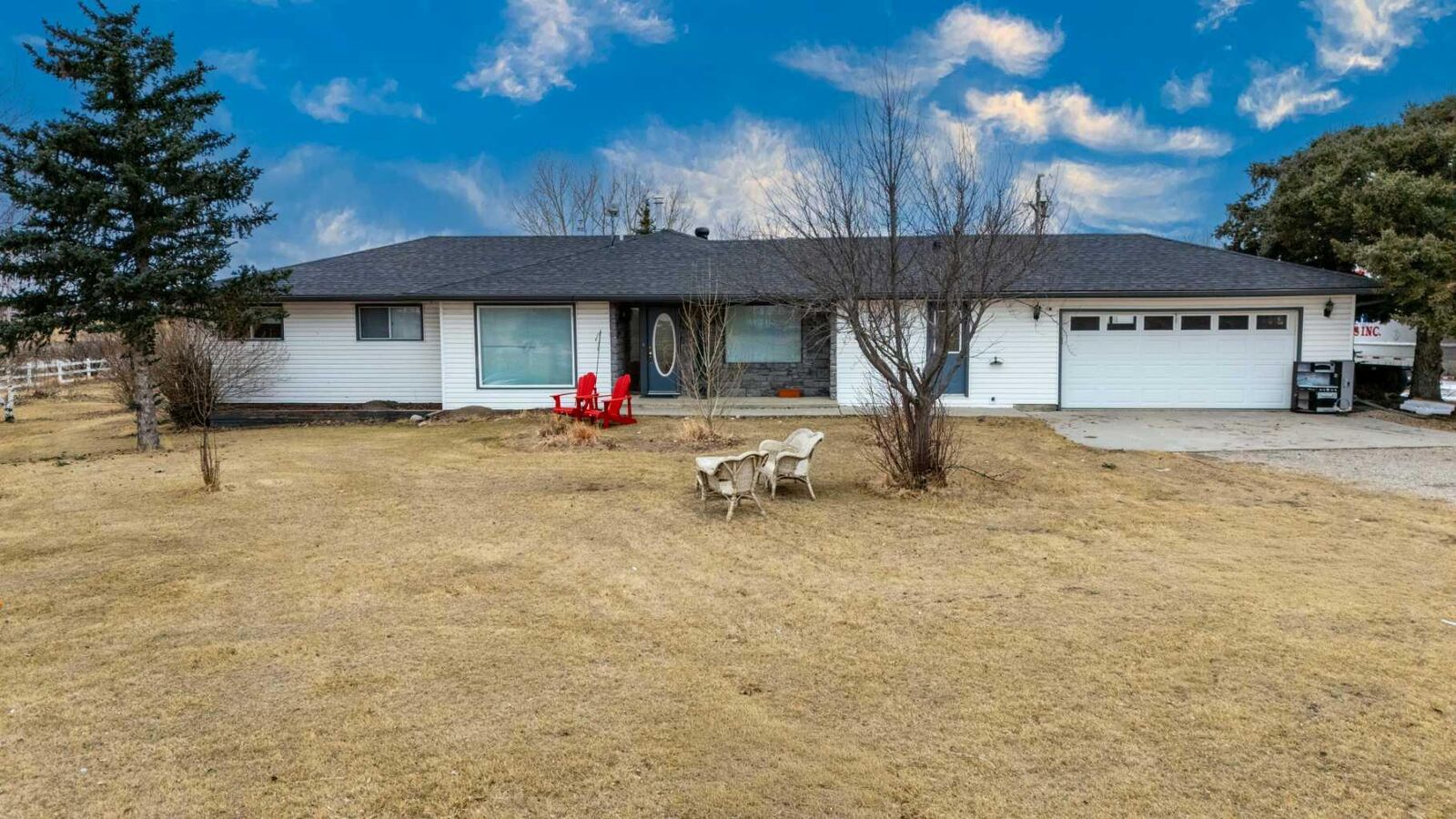 Property Photo: 233239 Glenmore View Road AB T1X 0H3