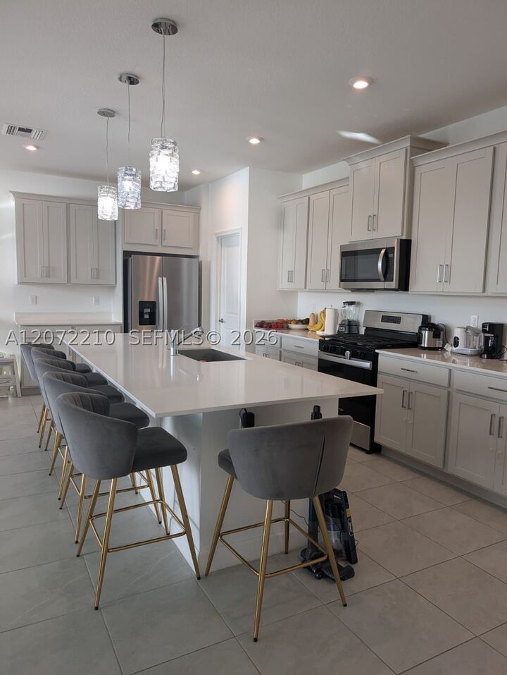 Property Photo:  10607 SW Orana Dr  FL 34987 