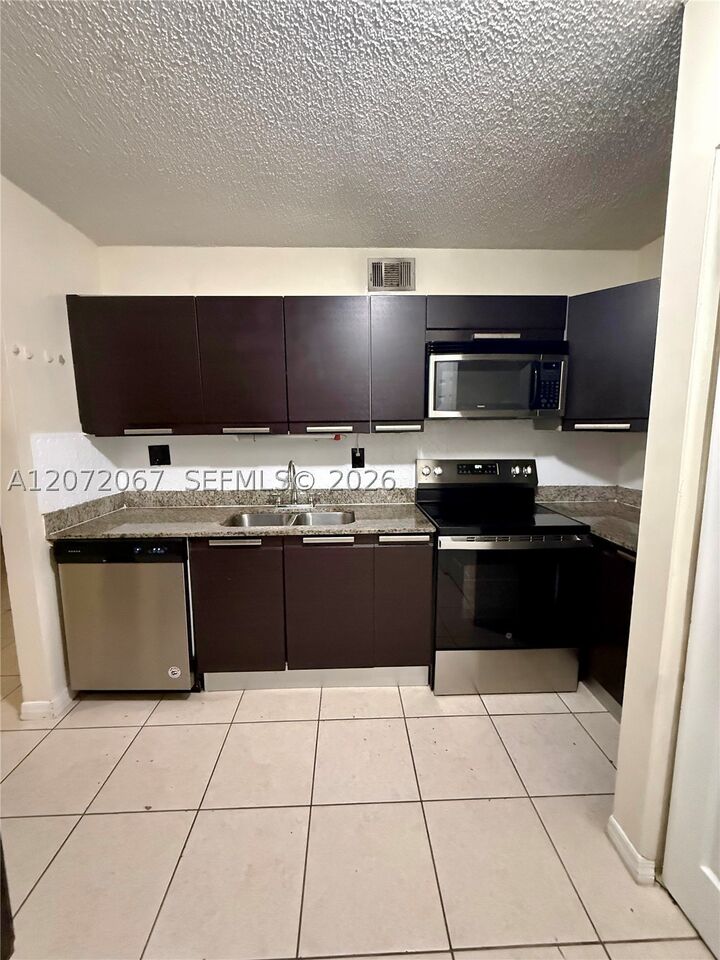 Property Photo: 11225 Royal Palm Blvd 11225 FL 33065