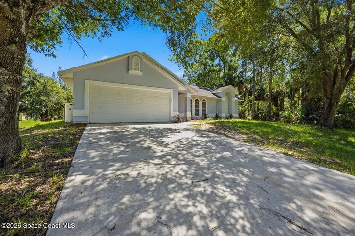Property Photo:  323 San Remo Road SW  FL 32908 