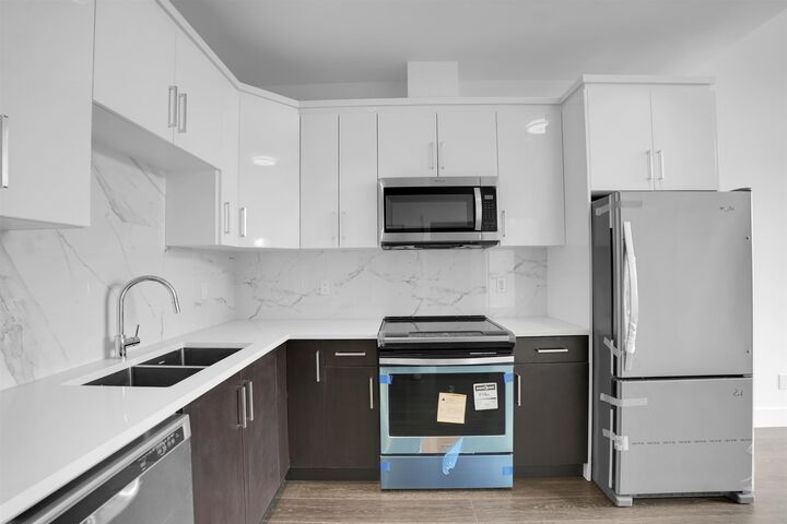 Property Photo: 9983 E Barnston Drive 504 BC V4N 6T3