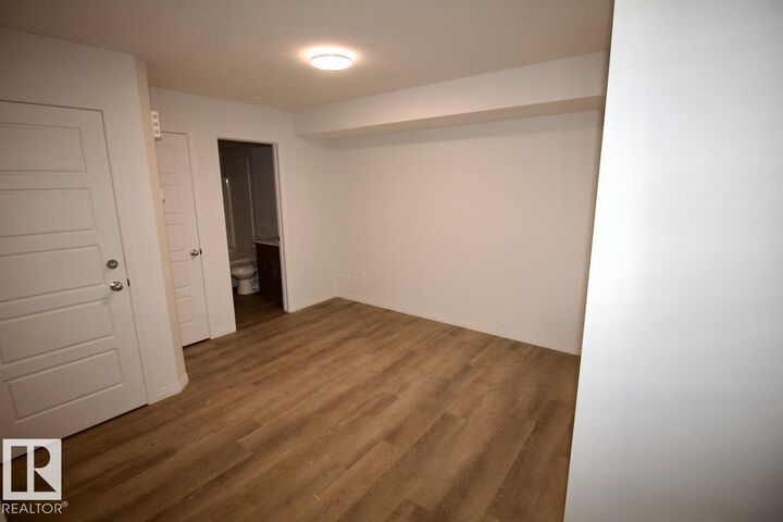 Property Photo:  3716 42 Avenue Bsmt  AB T4X 3B3 