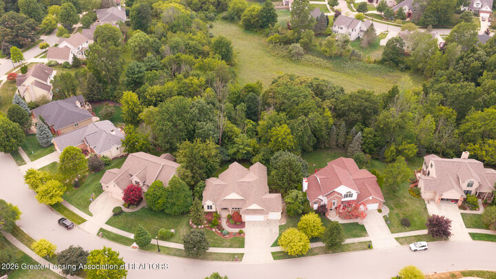 Property Photo:  5601 Wild Iris Lane  MI 48840 