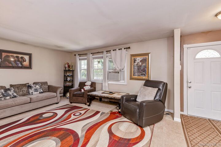 Property Photo:  312 Peconic Avenue  NY 11763 