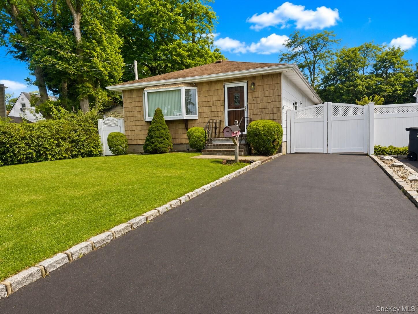 Property Photo: 4 Westwood Avenue NY 11729