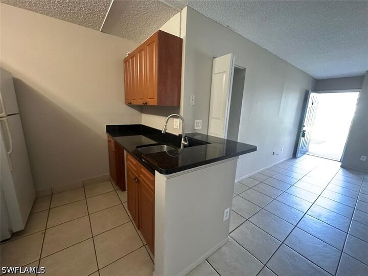 Property Photo:  142 N Santa Clara Drive 16  FL 34104 
