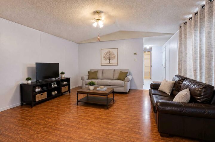 Property Photo:  209 Yardmaster Avenue  AB T1M 1P5 