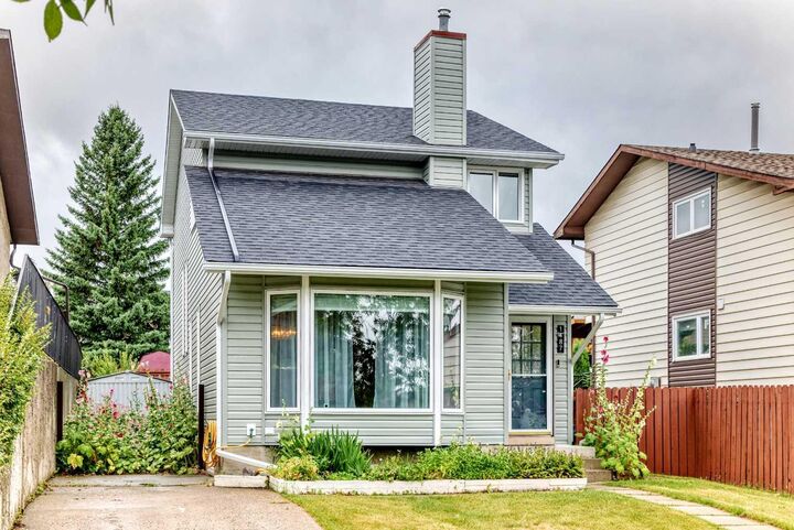 Property Photo: 1487 Berkley Drive NW AB T3K 1T7