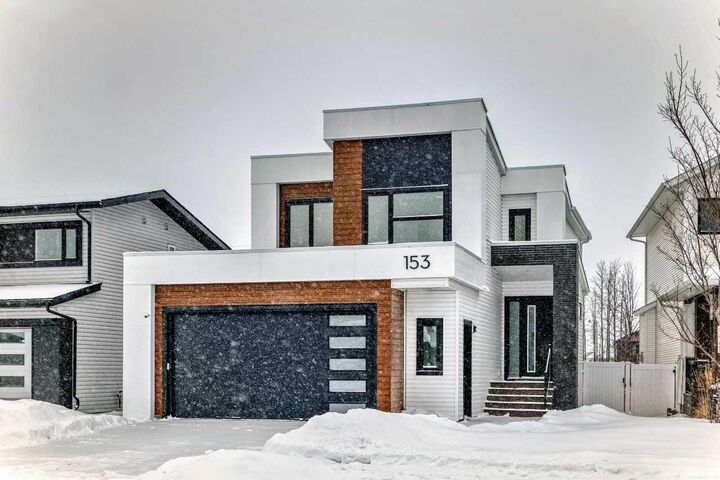 Property Photo: 153 Emerald Drive AB T4P 3G6
