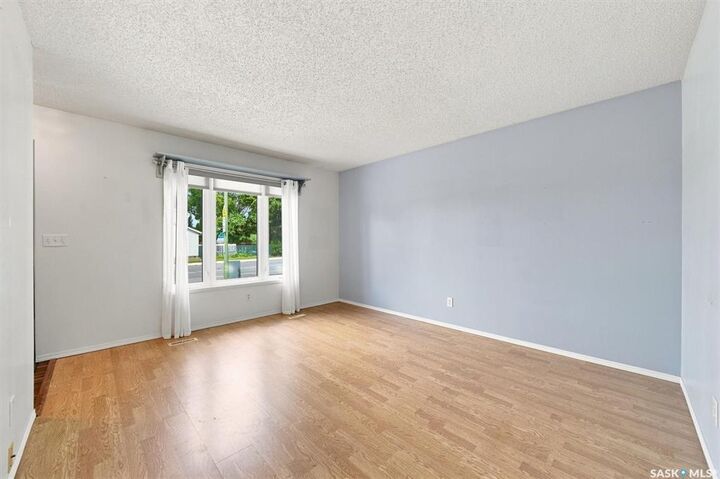Property Photo:  1202 McCormack Road  SK S7M 5L9 