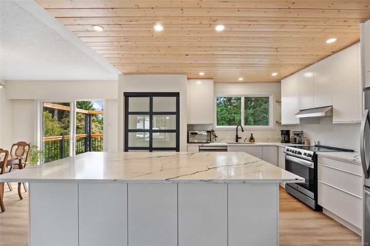 Property Photo: 1925 Cougar Cres BC V9M 2K4
