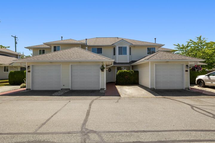 Property Photo: 21928 48 Avenue 18 BC V3A 8H1