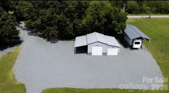 Property Photo:  8720 Potter Road S  NC 28173 
