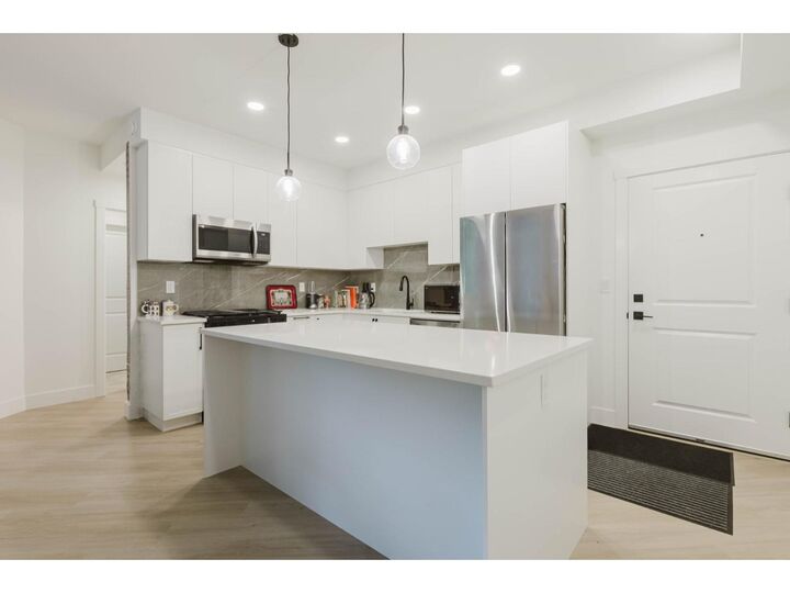 Property Photo:  3480 146A Street 418  BC V4P 0H6 