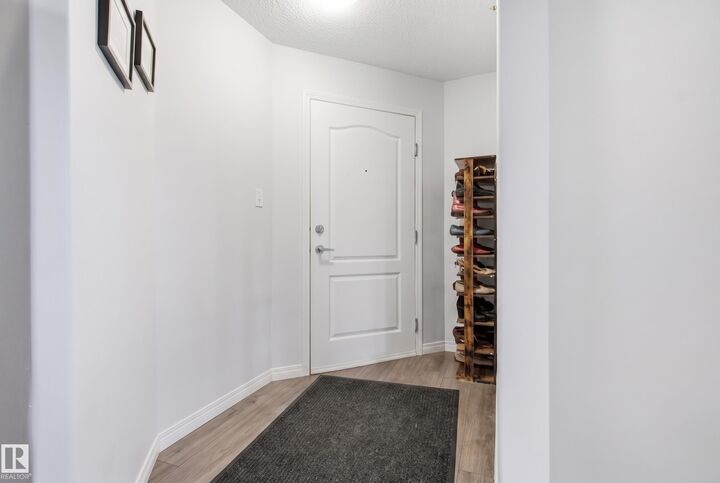 Property Photo: 9357 Simpson Drive NW 2415 AB T6R 0N3