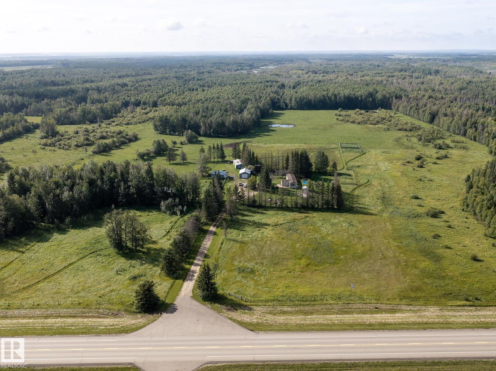 Property Photo:  214067 Hwy 55  AB T9S 1V7 