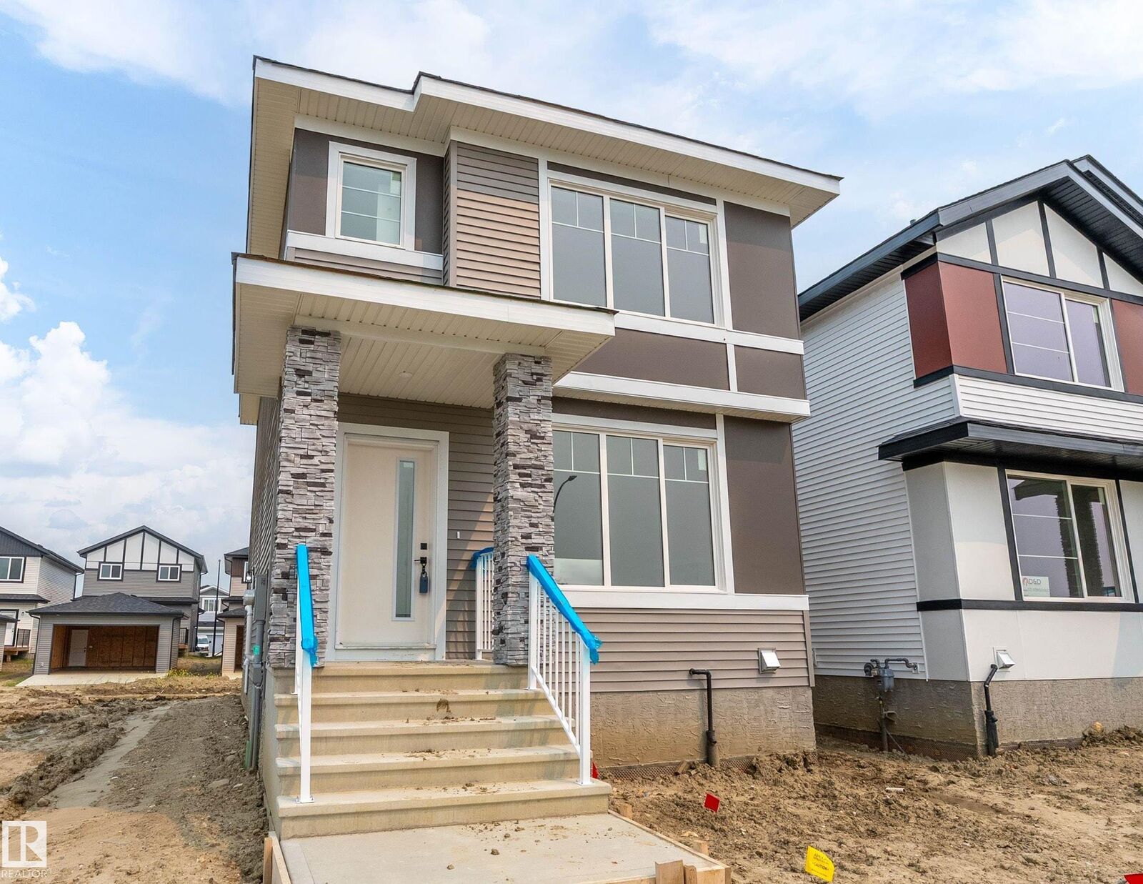 Property Photo:  523 Robinson Boulevard  AB T9E 1P8 