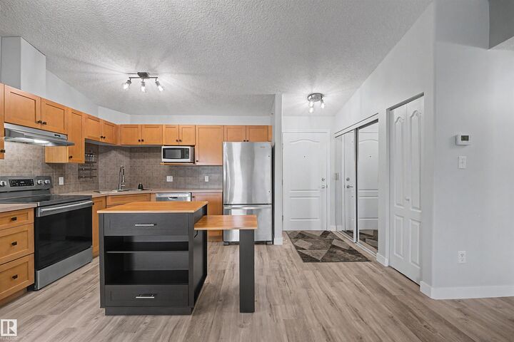 Property Photo:  9363 Simpson Drive NW 1432  AB T6R 0N2 