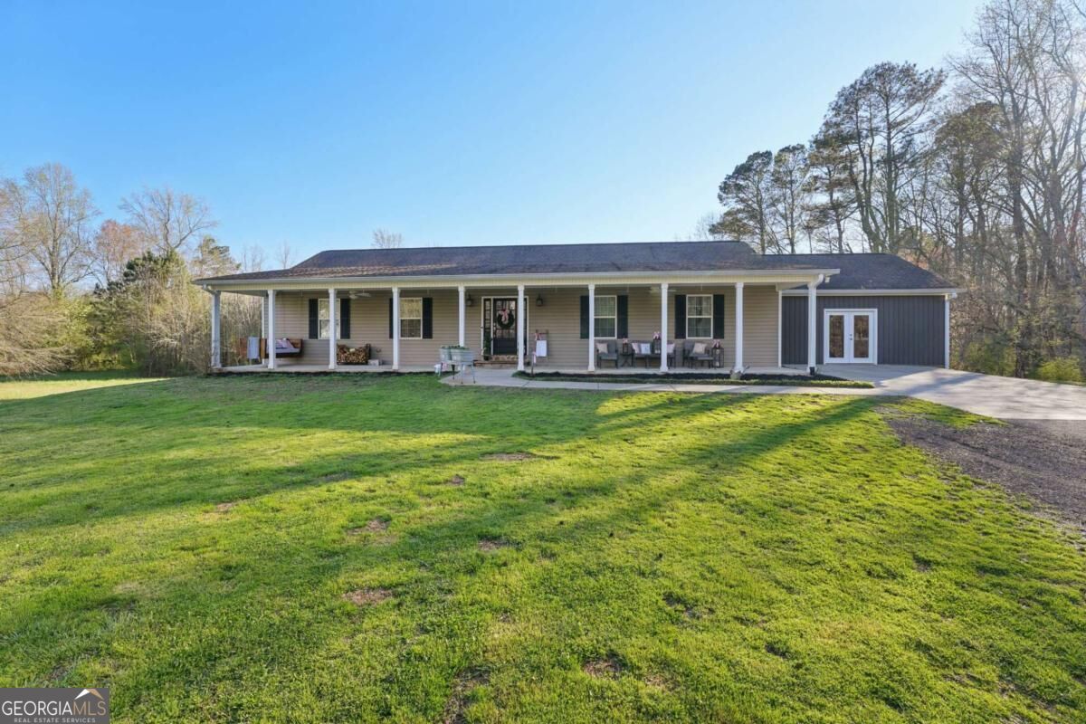 Property Photo:  6471 Forsyth Drive  GA 30028 