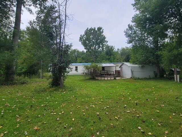 Property Photo:  2685 W Howard  MI 48612 