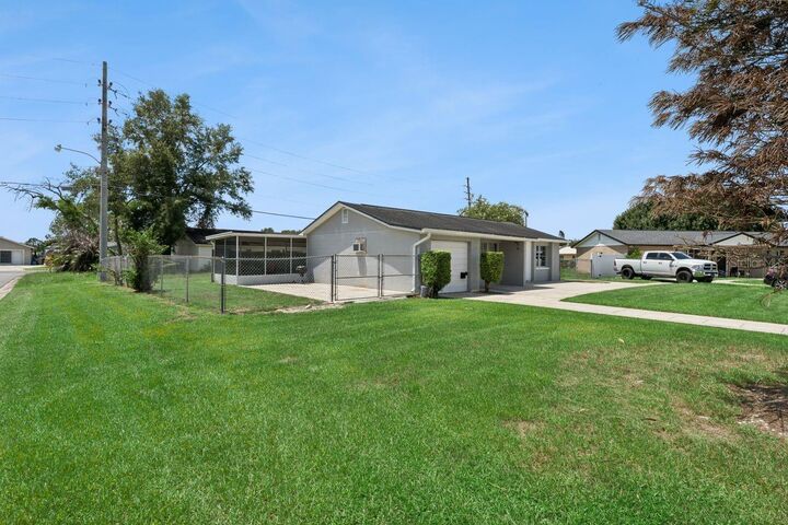 Property Photo:  110 Tangerine Court  FL 34743 