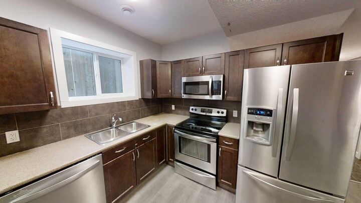 Property Photo:  8634 88B Street A  AB T8X 0P3 