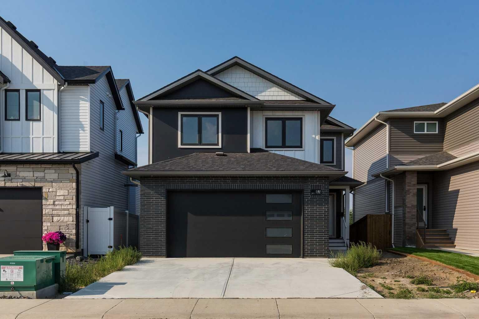 Property Photo:  561 Malahat Green W  AB T1J 5H1 