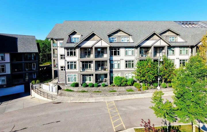 Property Photo: 15 Aspenmont Heights SW 206 AB T3H 0E3
