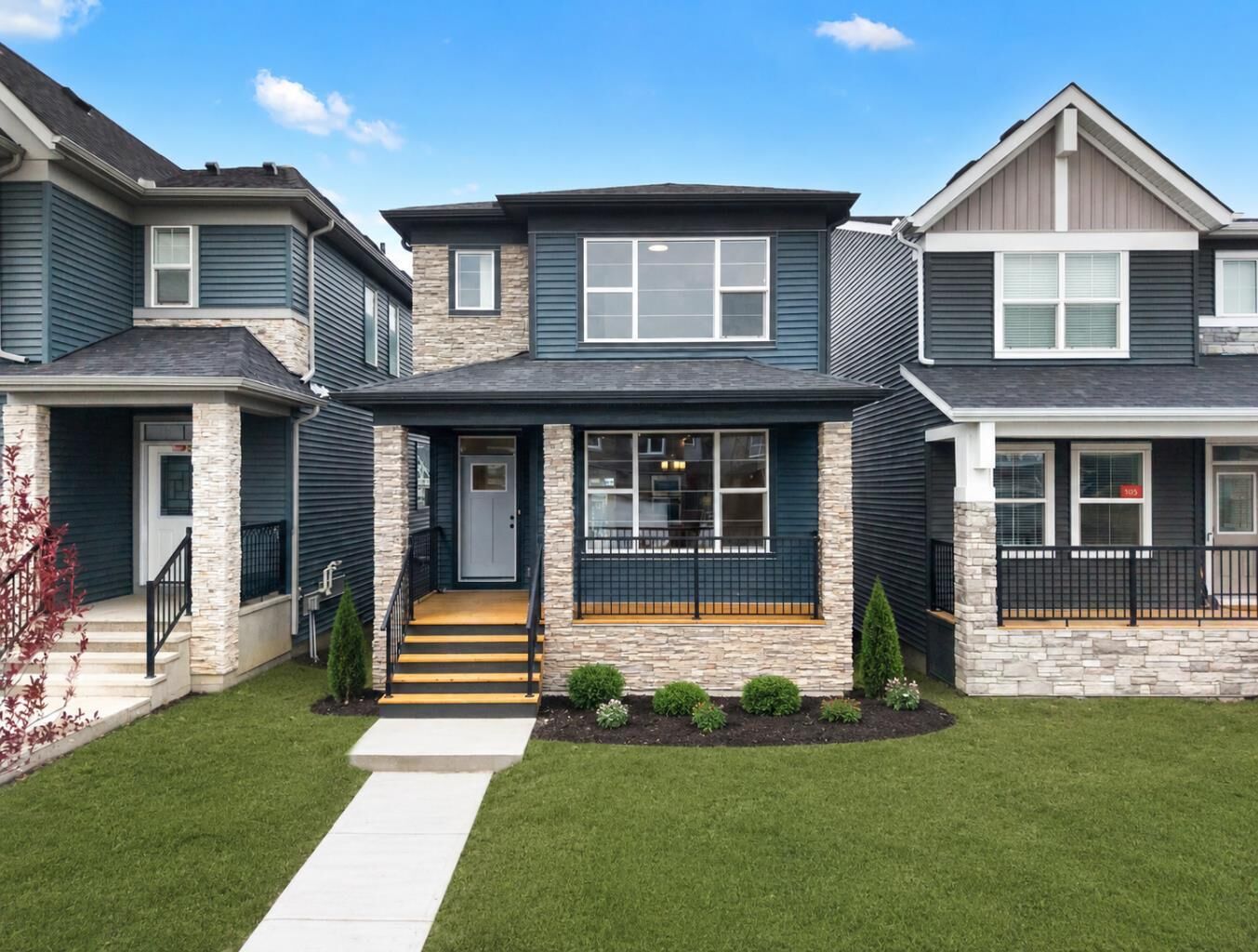 Property Photo: 109 Creekview Manor SW AB T2X 5Y1
