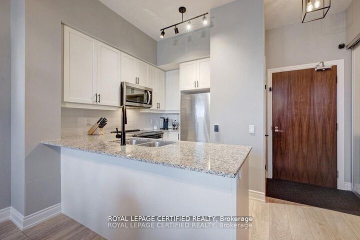Property Photo:  1050 Main Street E 114  ON L9T 9M3 