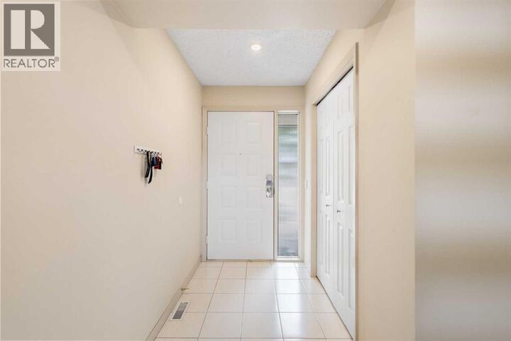 Property Photo: 10401 19 Street Southwest AB T2W 3E7