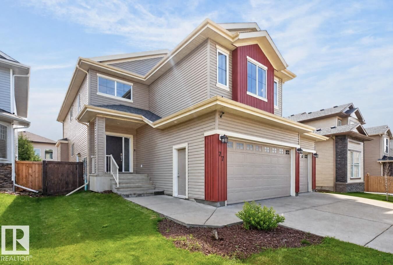 Property Photo: 77 Caragana Way AB T8L 0H4