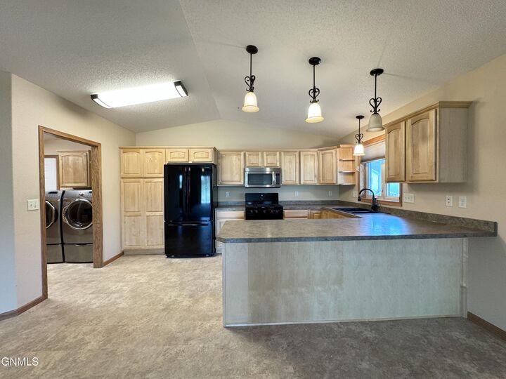 Property Photo:  3213 Nebraska Drive 3  ND 58503 