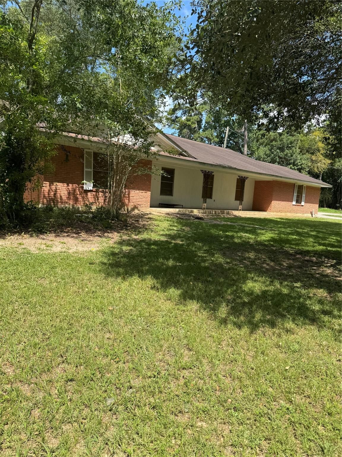 Property Photo:  310 S Highway 150  TX 77331 