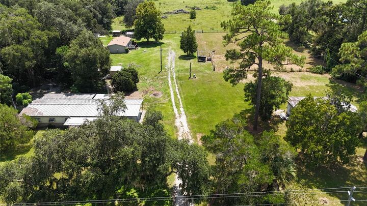 Property Photo:  2665, 2639 E Hwy 466  FL 34484 